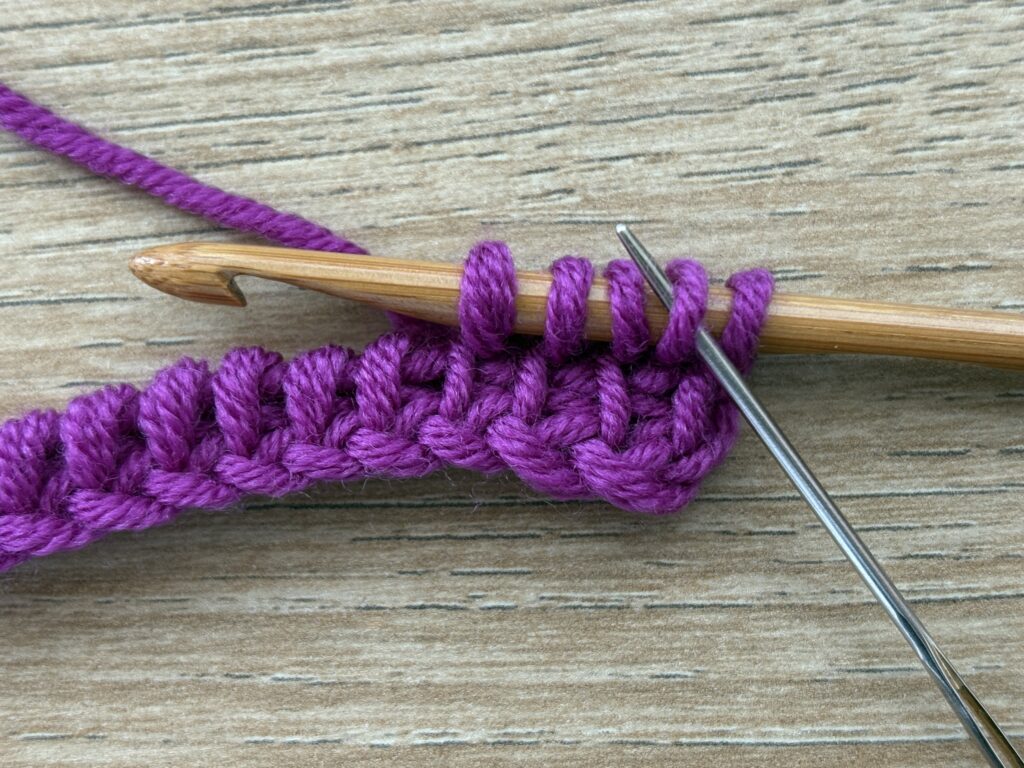 Tunisch entrelac met een twist steek 18 Tunisch Enterlac twist stap 13