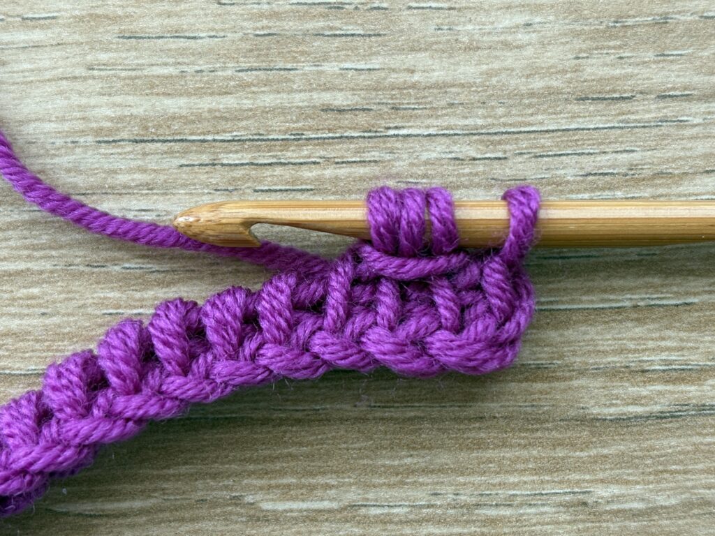 Tunisch entrelac met een twist steek 19 Tunisch Enterlac twist stap 14