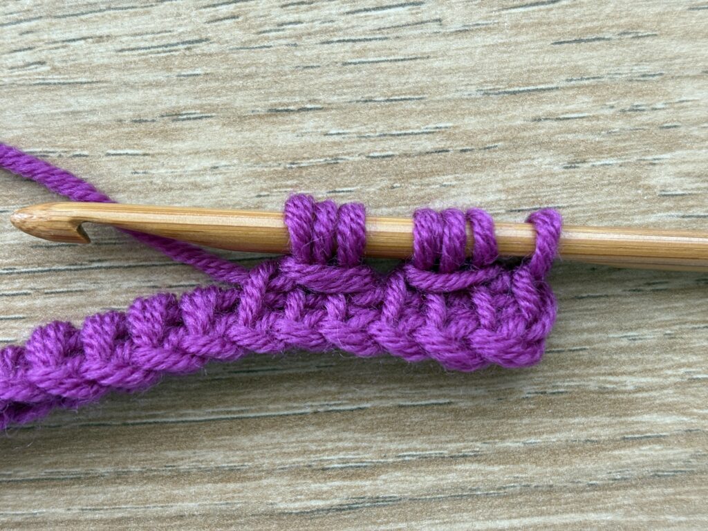 Tunisch entrelac met een twist steek 23 Tunisch Enterlac twist stap 18