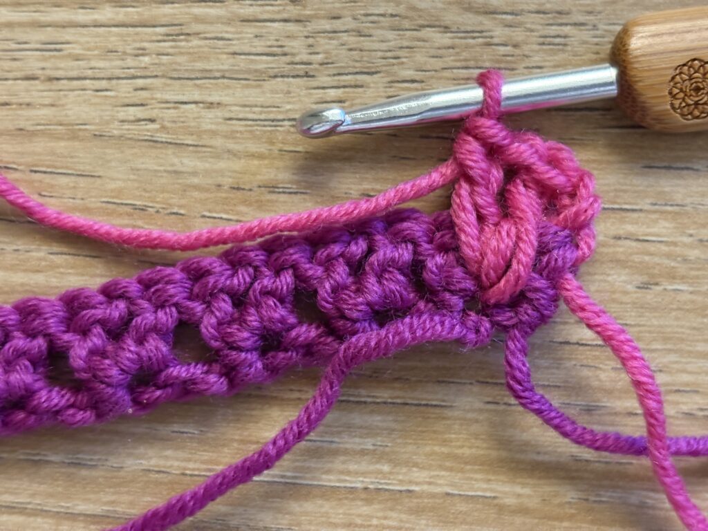 Genestelde V steek stap 16