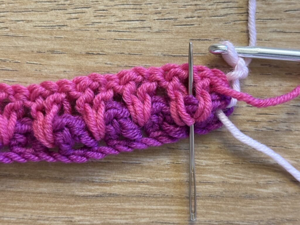 Genestelde V steek stap 22