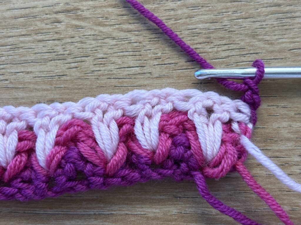 Genestelde V steek stap 27