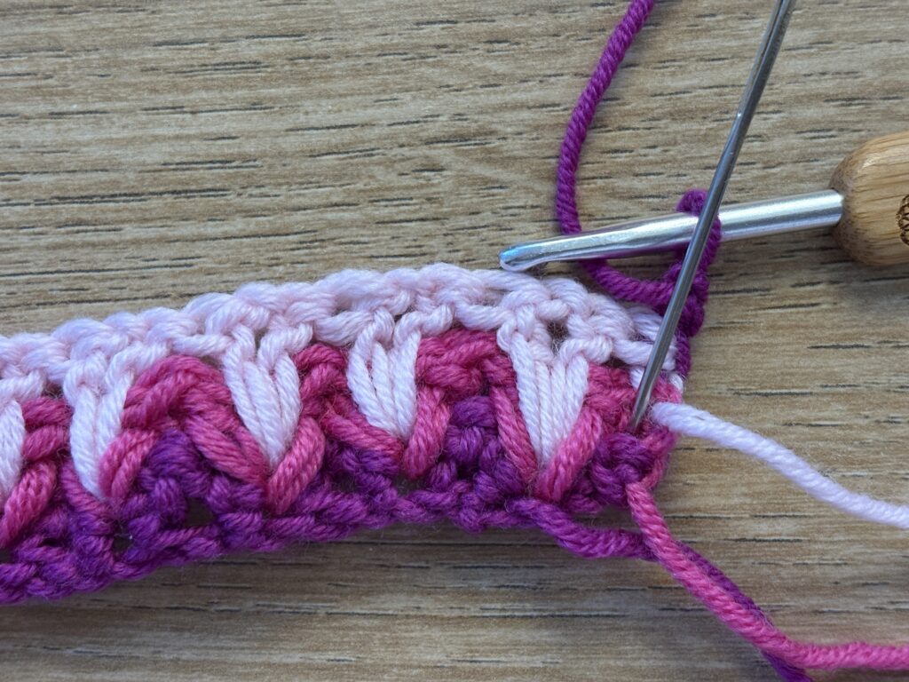 Genestelde V steek stap 28