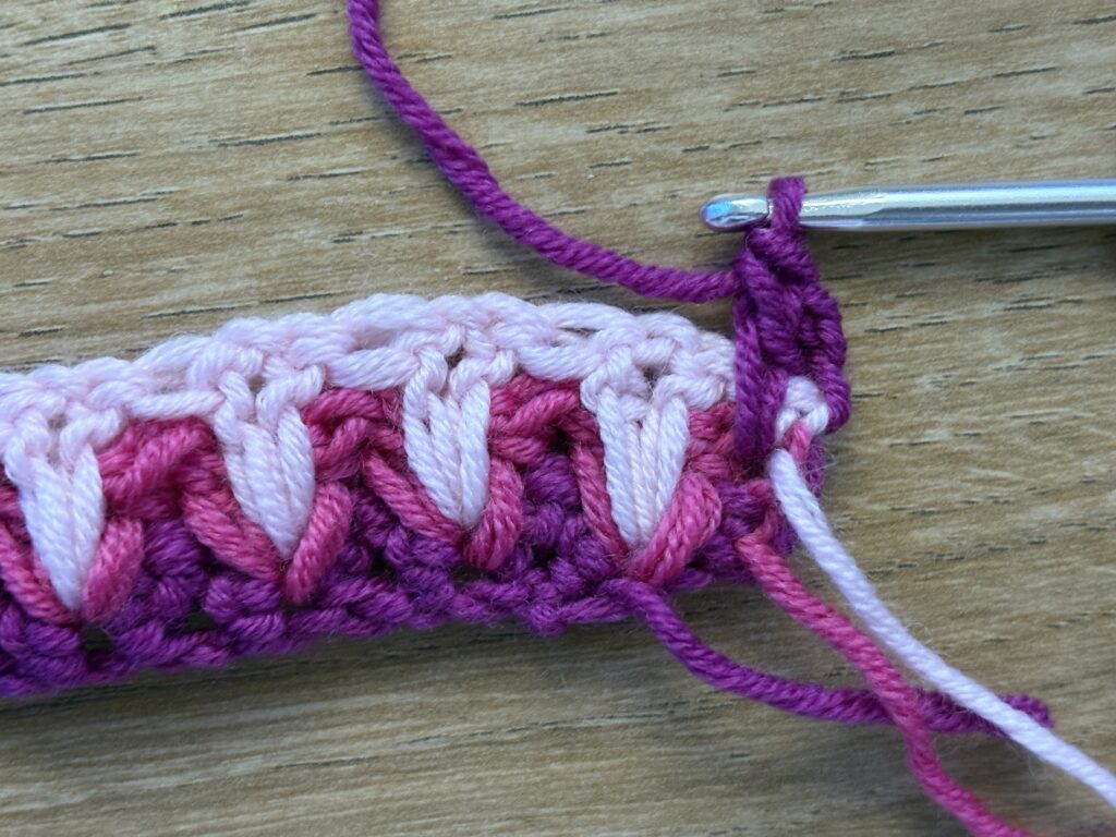 Genestelde V steek stap 29