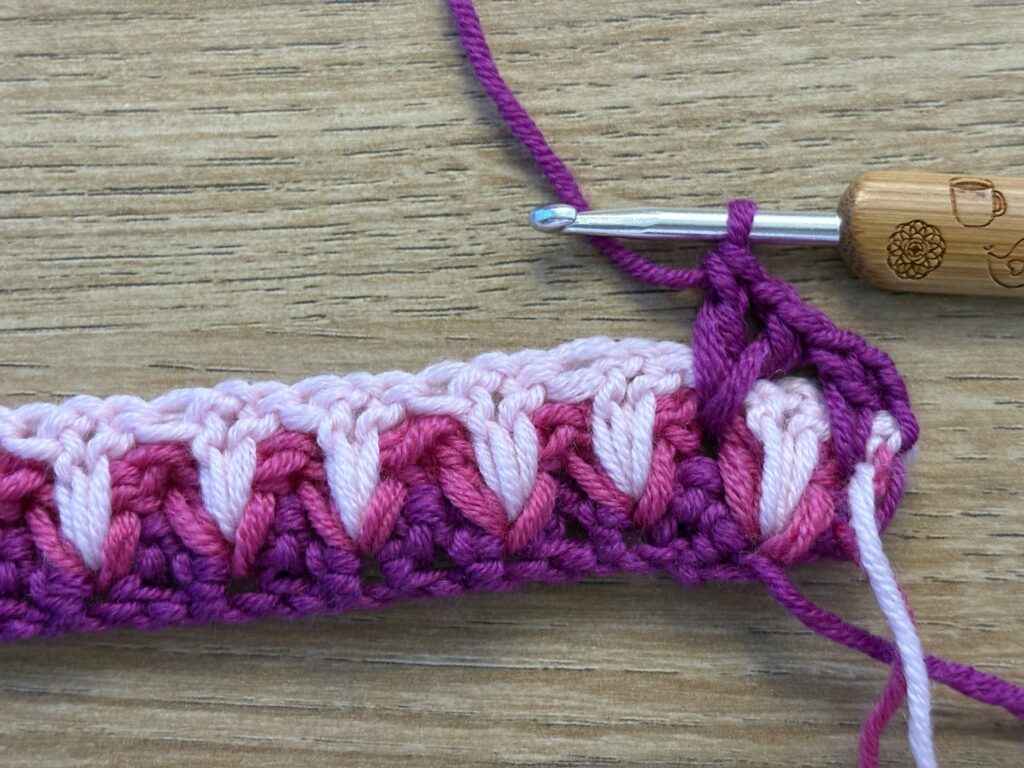 Genestelde V steek stap 31