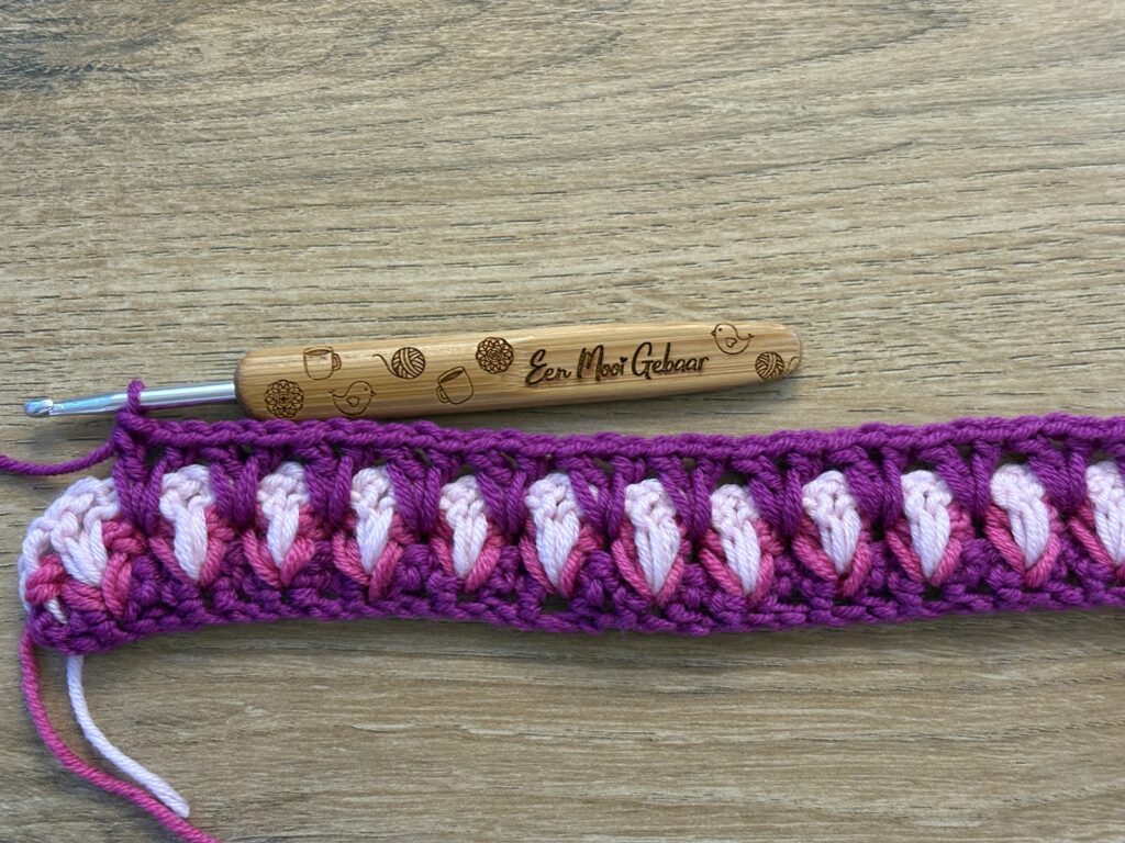 Genestelde V steek stap 32