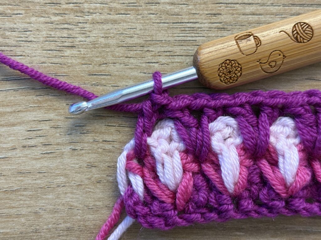 Genestelde V steek stap 33