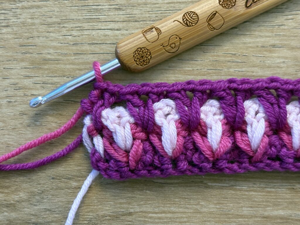 Genestelde V steek stap 34