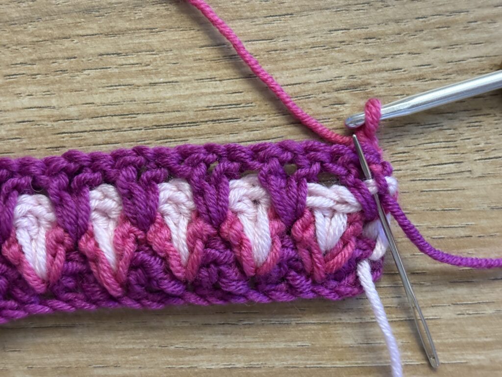 Genestelde V steek stap 36