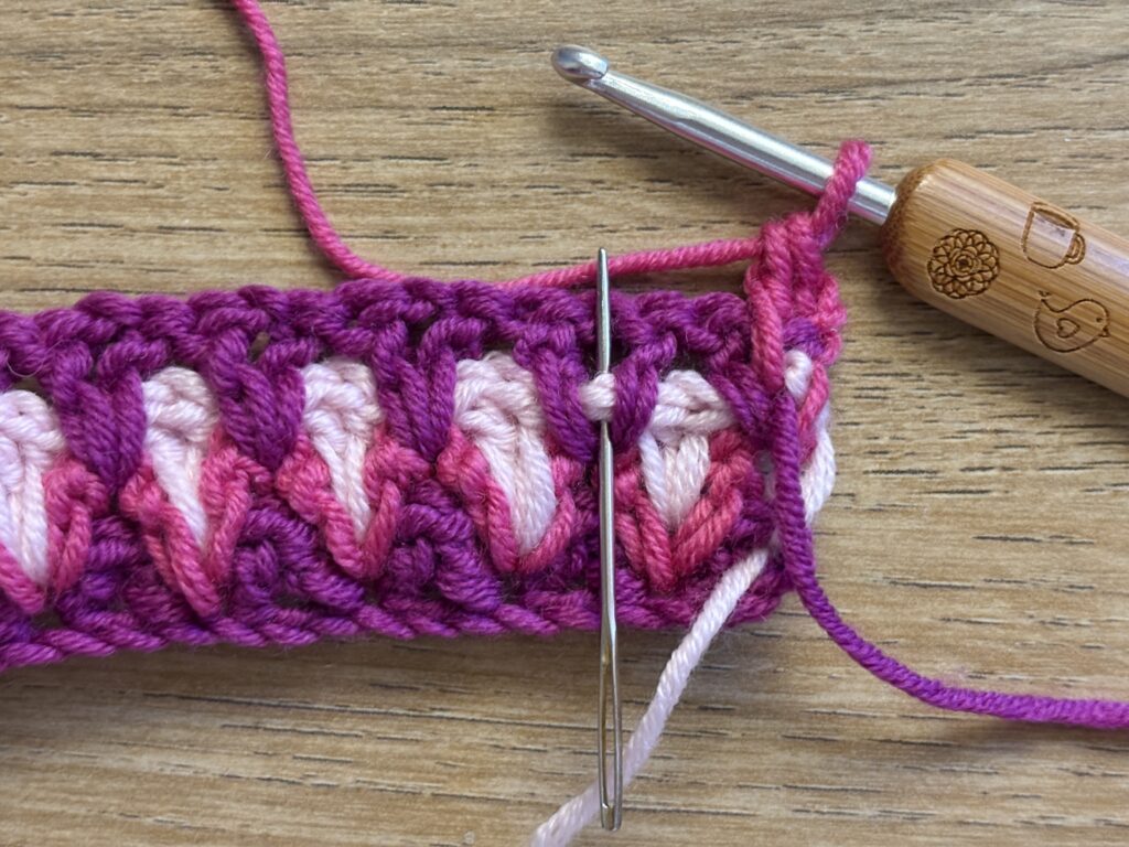 Genestelde V steek stap 38