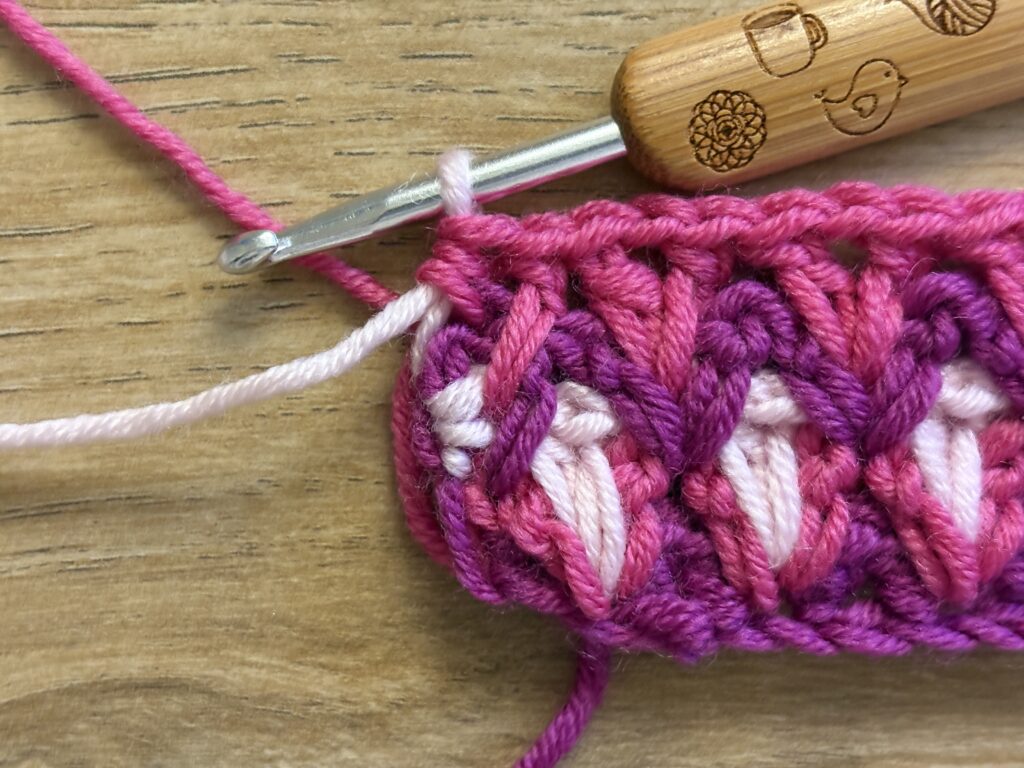 Genestelde V steek stap 42