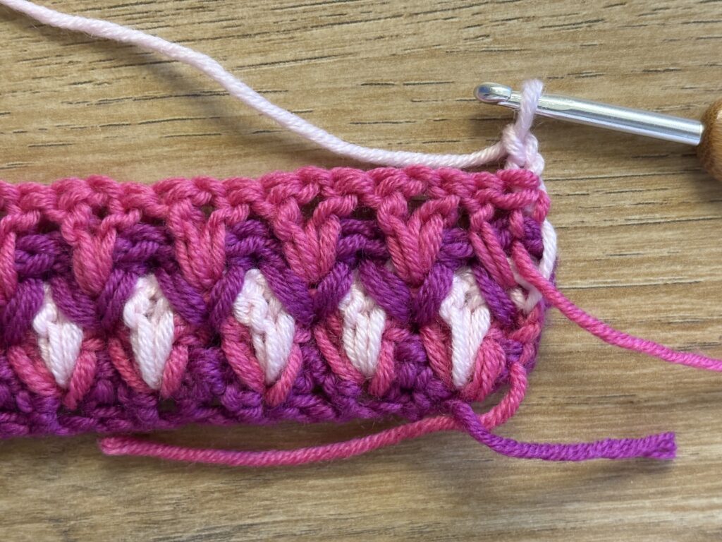 Genestelde V steek stap 43