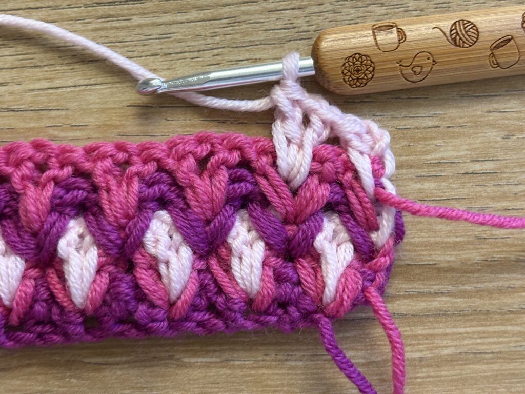 Genestelde V steek stap 47