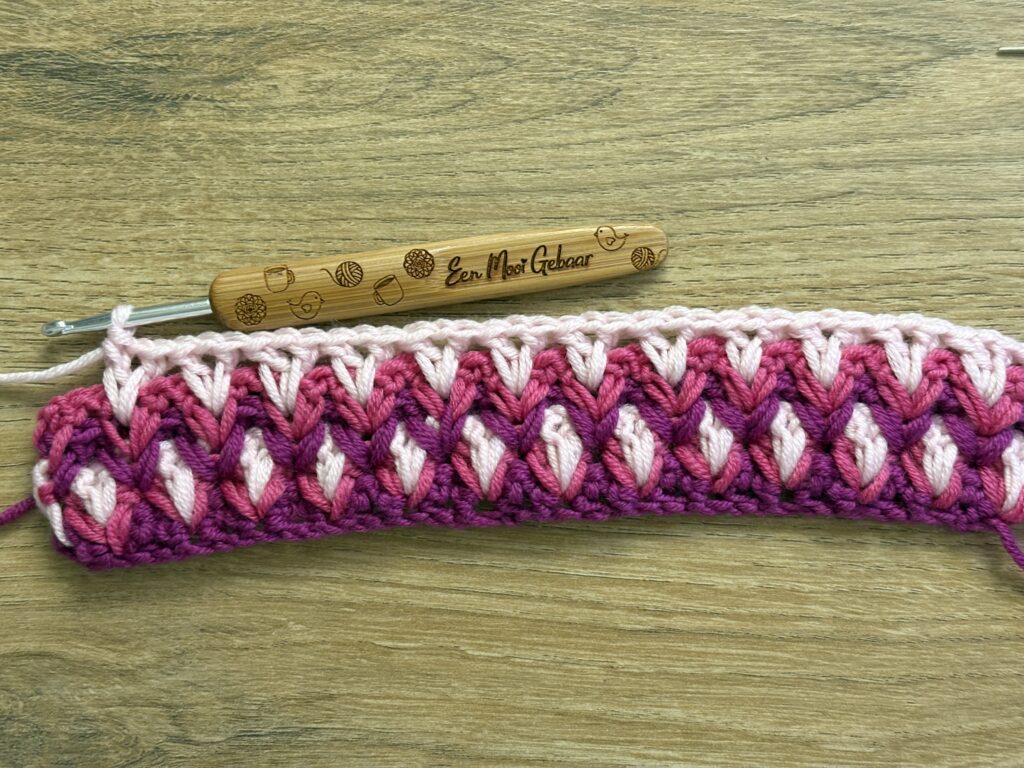 Genestelde V steek stap 48