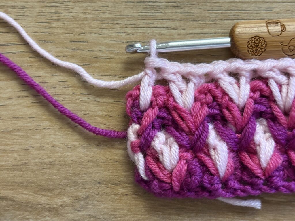 Genestelde V steek stap 49