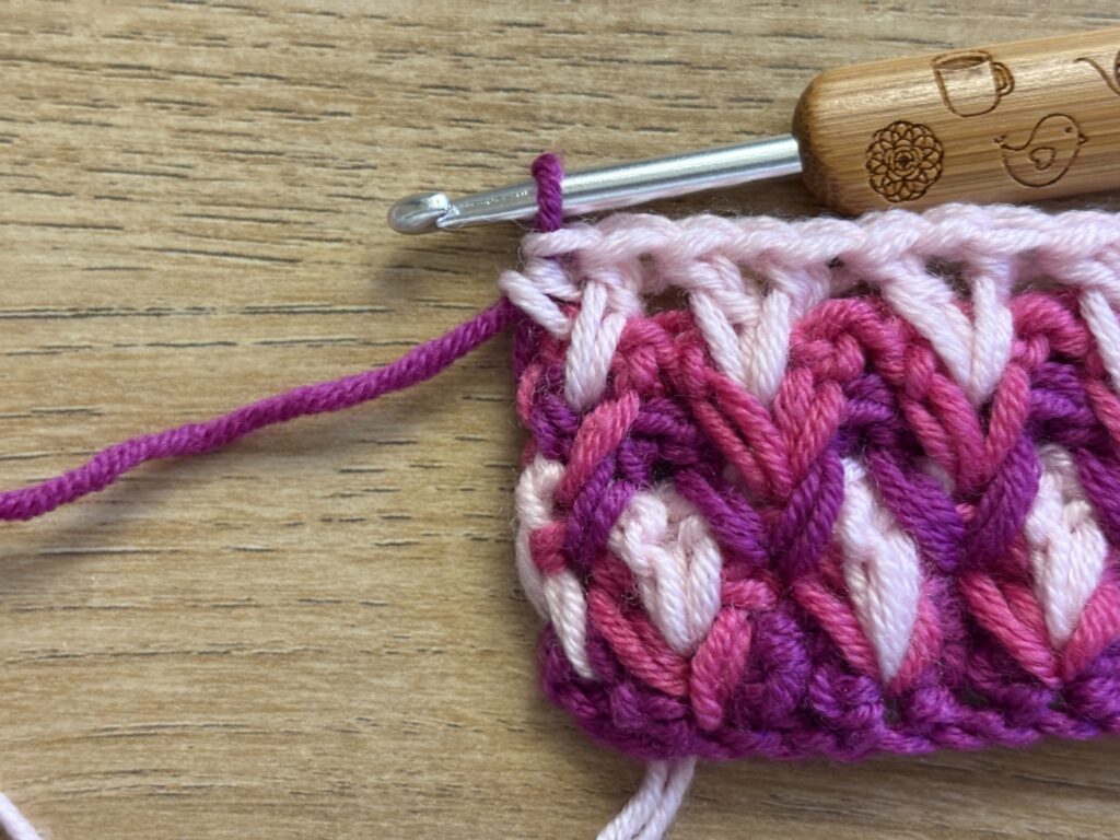 Genestelde V steek stap 50