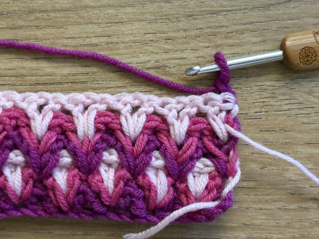 Genestelde V steek stap 51