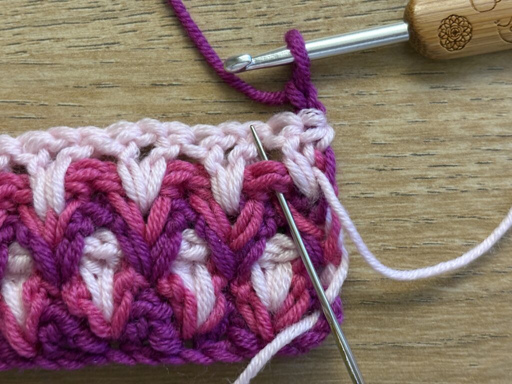 Genestelde V steek stap 52