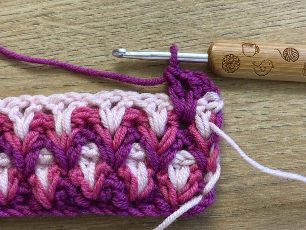 Genestelde V steek stap 53