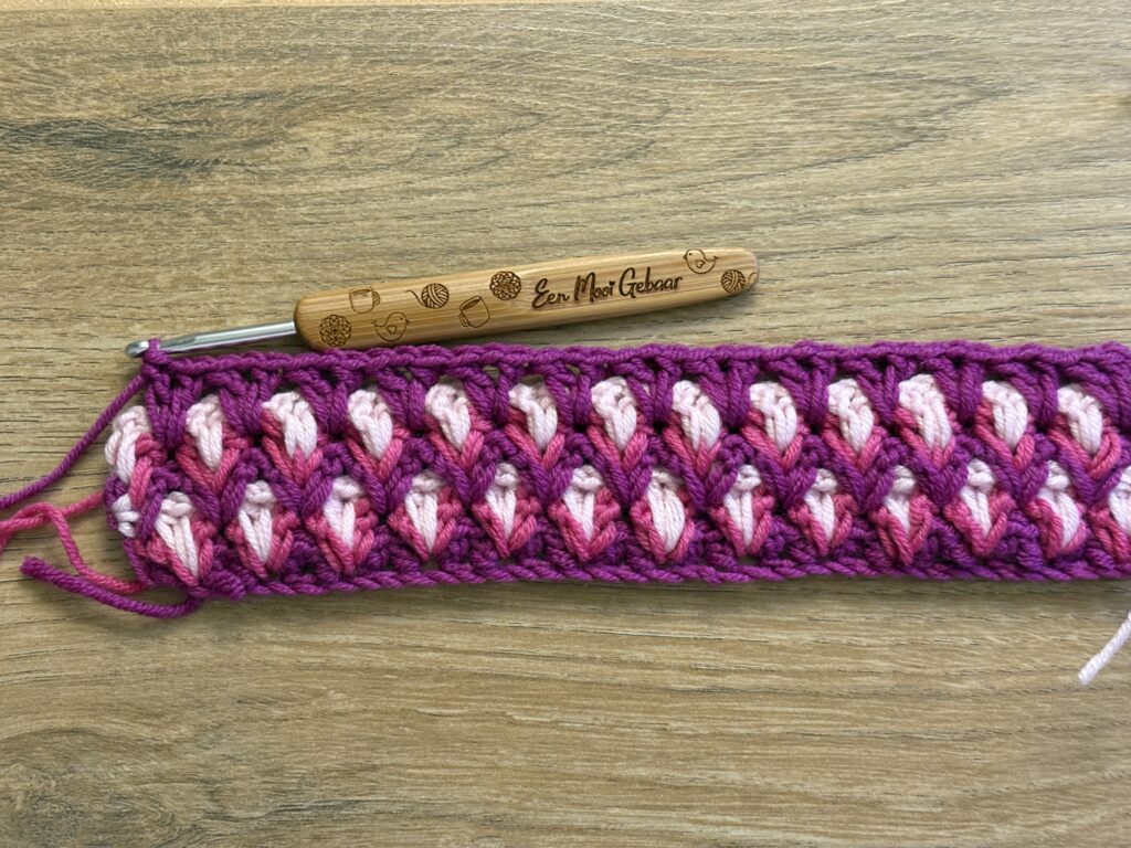 Genestelde V steek stap 54