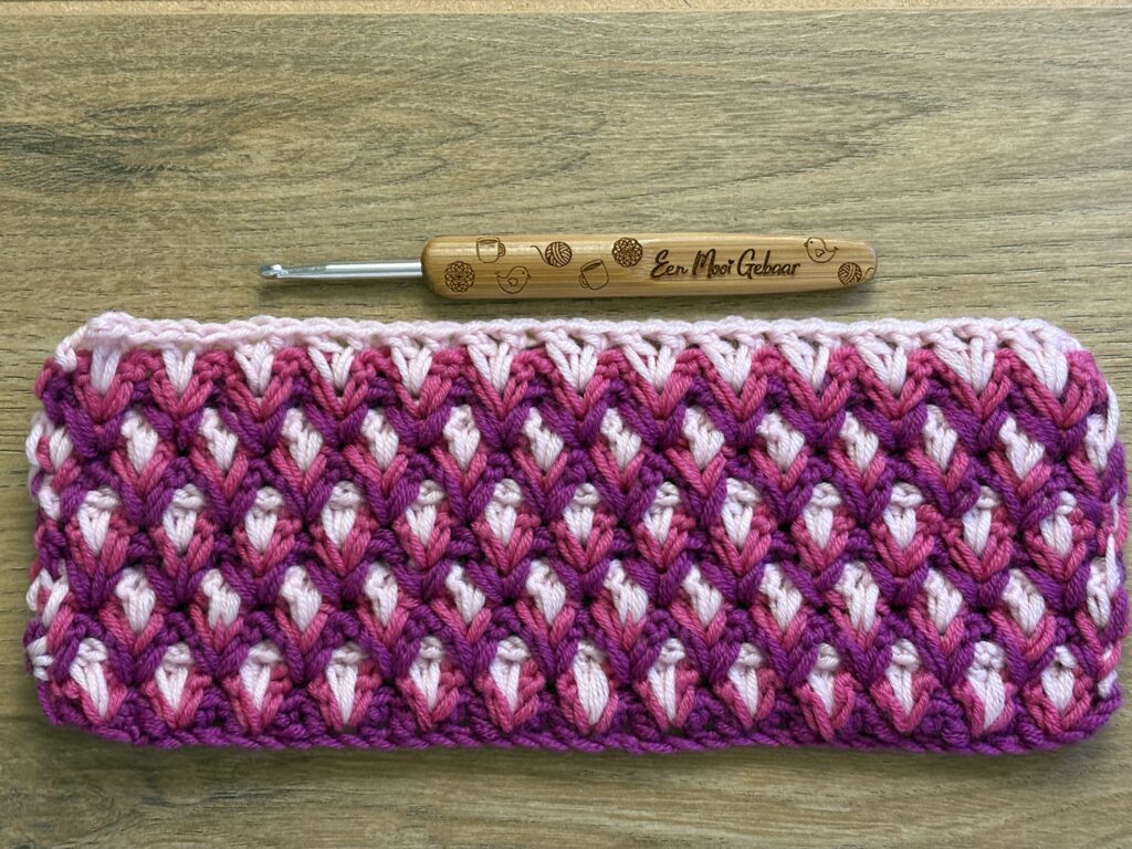 Genestelde V steek stap 56